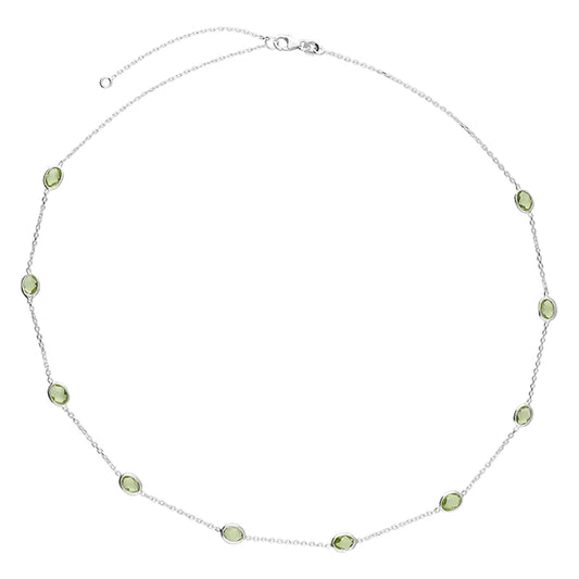 Silver and lab grown peridot station necklace