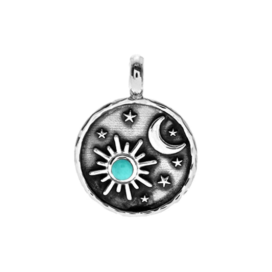 Silver and synthetic turquoise sun, moon and stars pendant