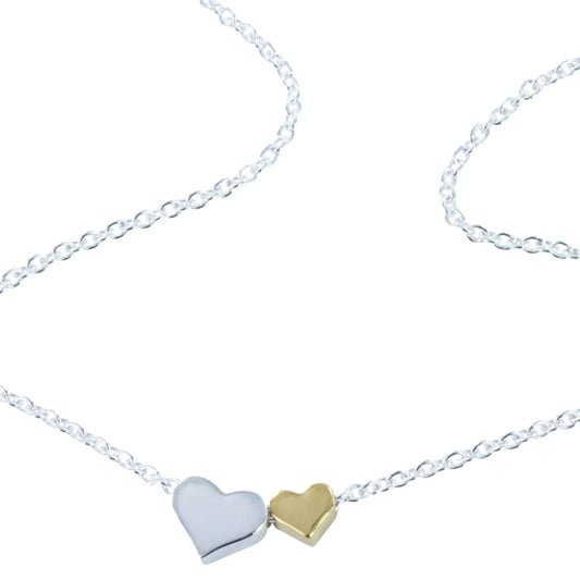 Silver double heart necklace with yellow gold detail