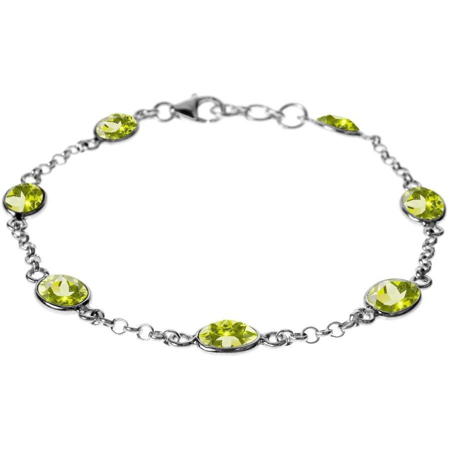 Silver and oval peridot bracelet.