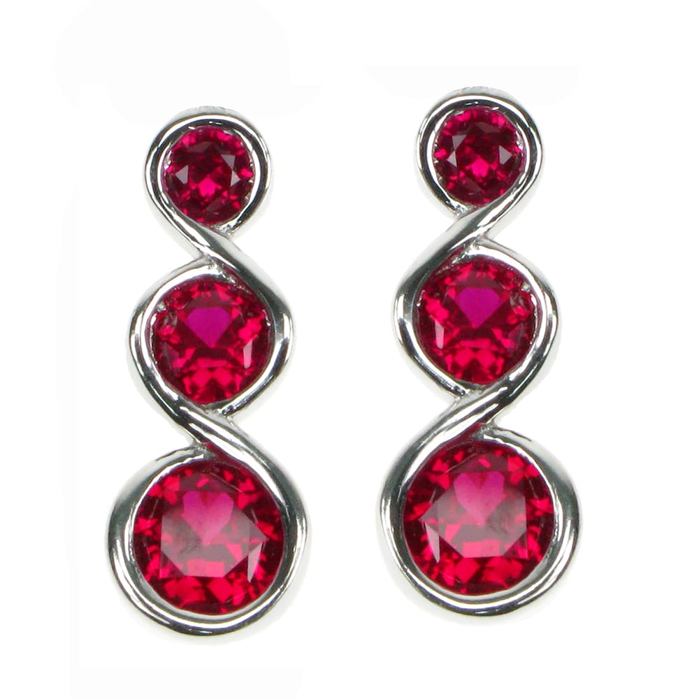 Silver three facet round created Ruby stud earrings