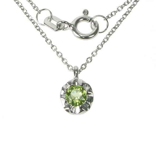 Silver and Peridot round disc set pendant