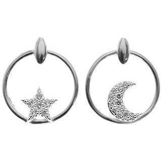 Silver and cubic zirconia star and moon open stud earrings.