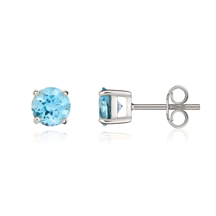 9CT White Gold And Blue Topaz Stud Earrings
