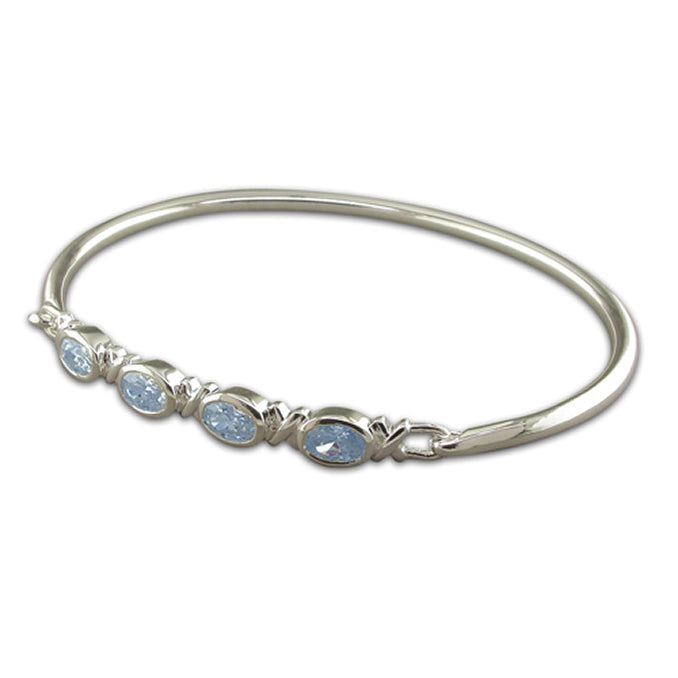 Silver and blue topaz hinged solid bangle