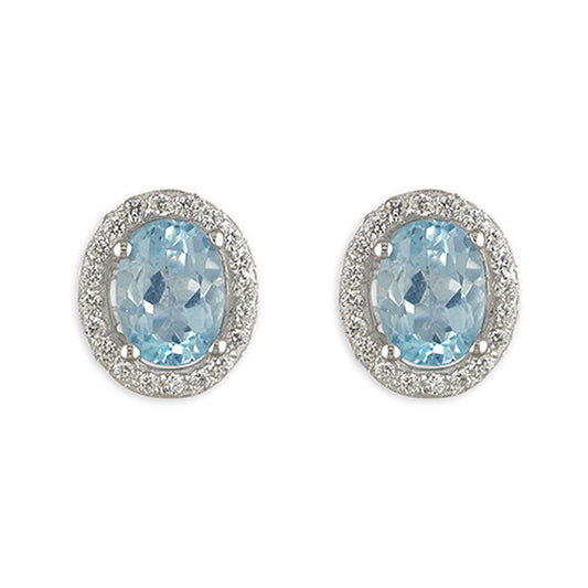 Silver and oval blue topaz with cubic zirconia earrings and pendant set