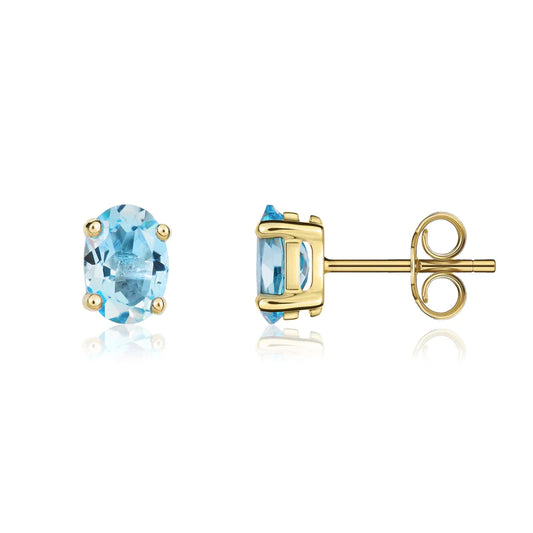 9CT Gold And Blue Topaz Oval Stud Earrings