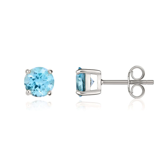 9CT White Gold And Blue Topaz Stud Earrings